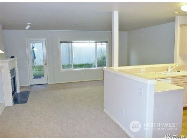 Property Photo:  8125 212th Street SW 12  WA 98026 