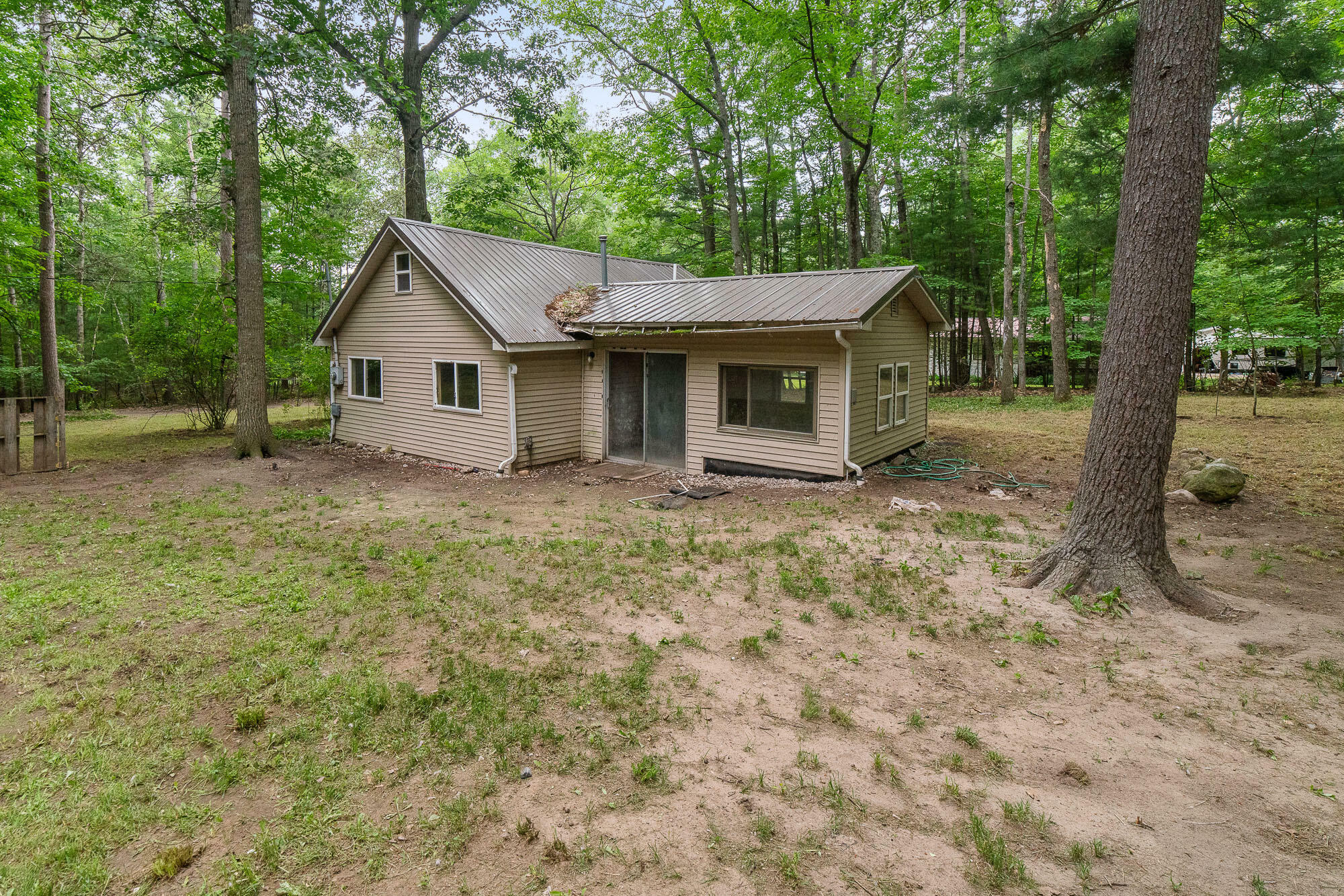 Property Photo:  6888 Van Tassel Trail  MI 49749 