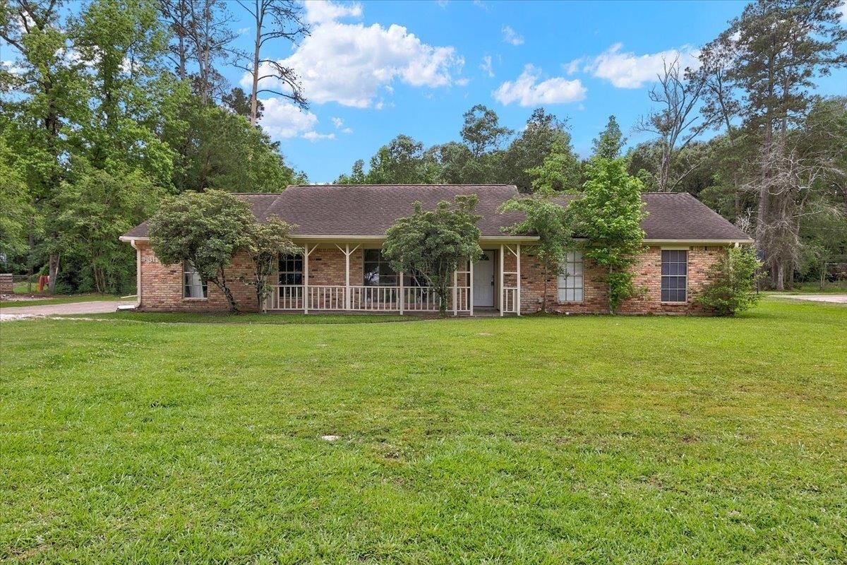 Property Photo:  311 Pinemont Dr  TX 77659 