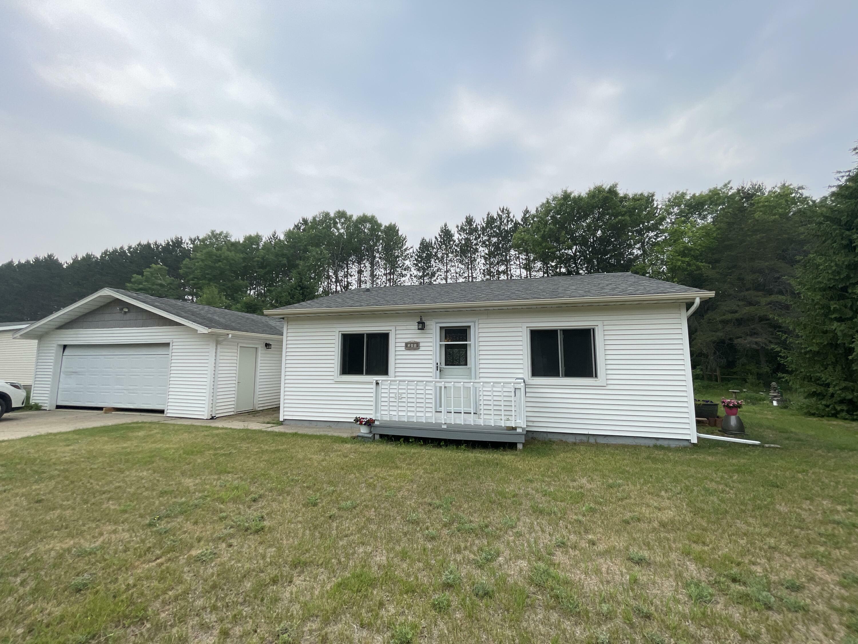 Property Photo:  205 W Love'S Drive  MI 48653 