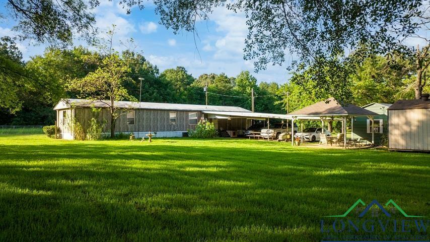 Property Photo:  1319 N Cr 1124 Gulf Camp Road  TX 75662 