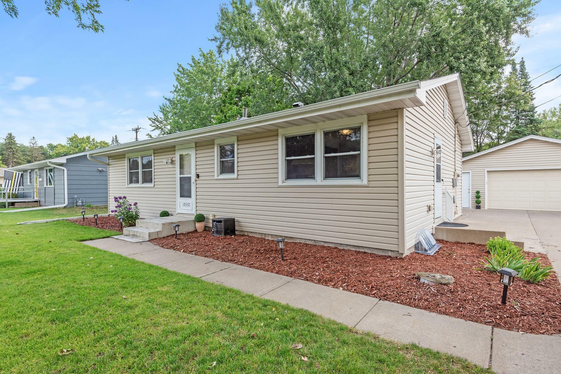 Property Photo:  10357 National Street NE  MN 55014 