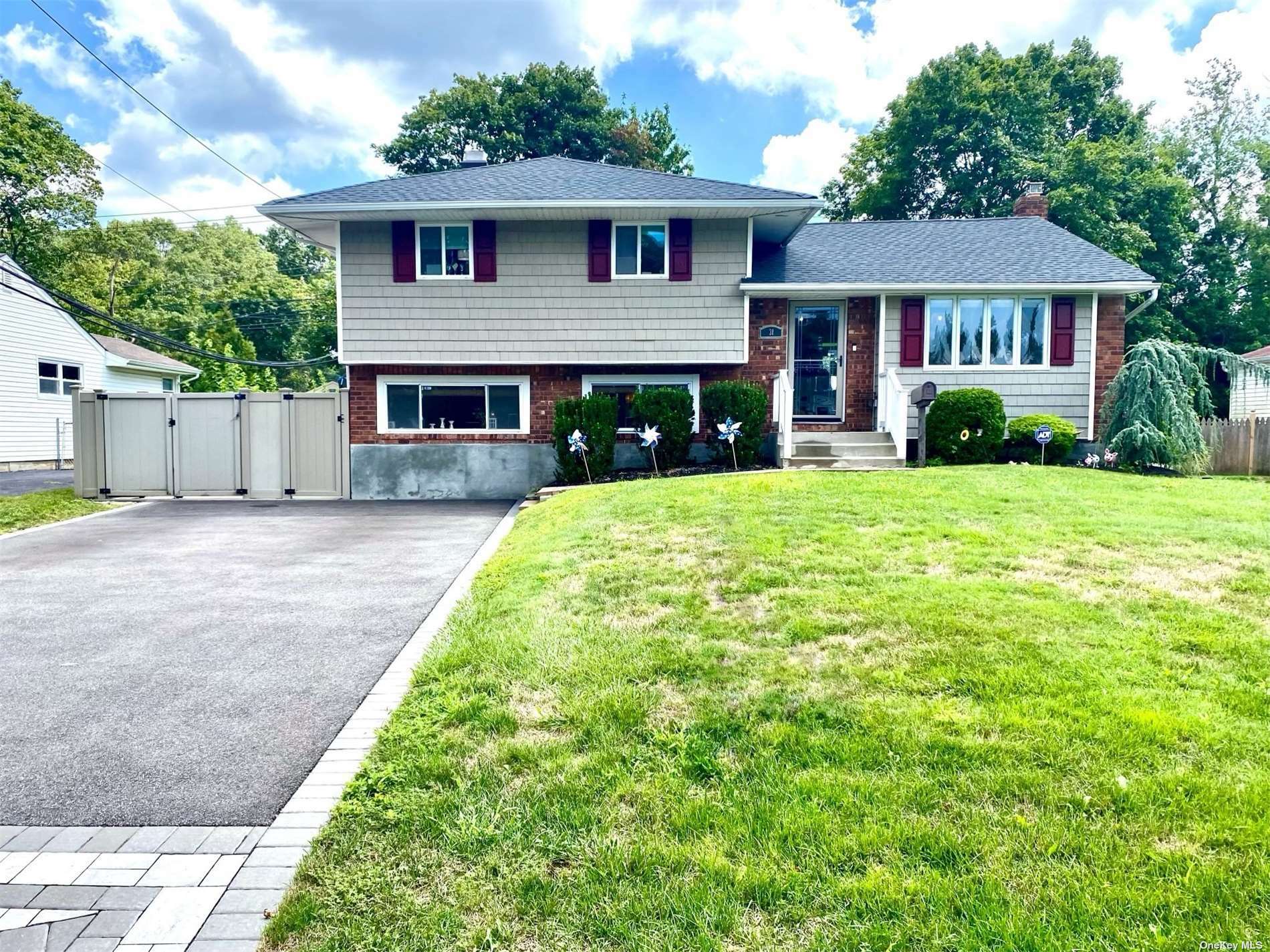 Property Photo:  31 Ramsey Road  NY 11725 