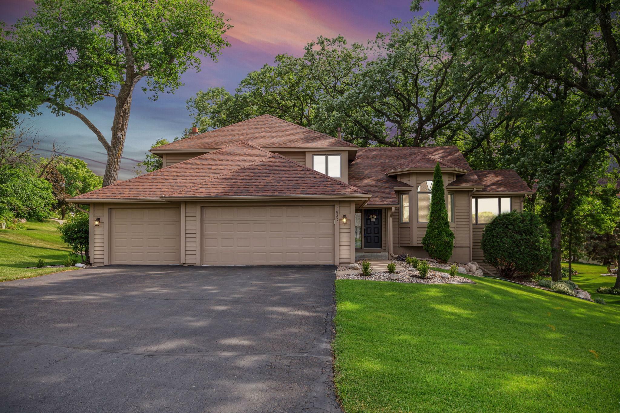 Property Photo:  1825 Woodstone Drive  MN 55386 