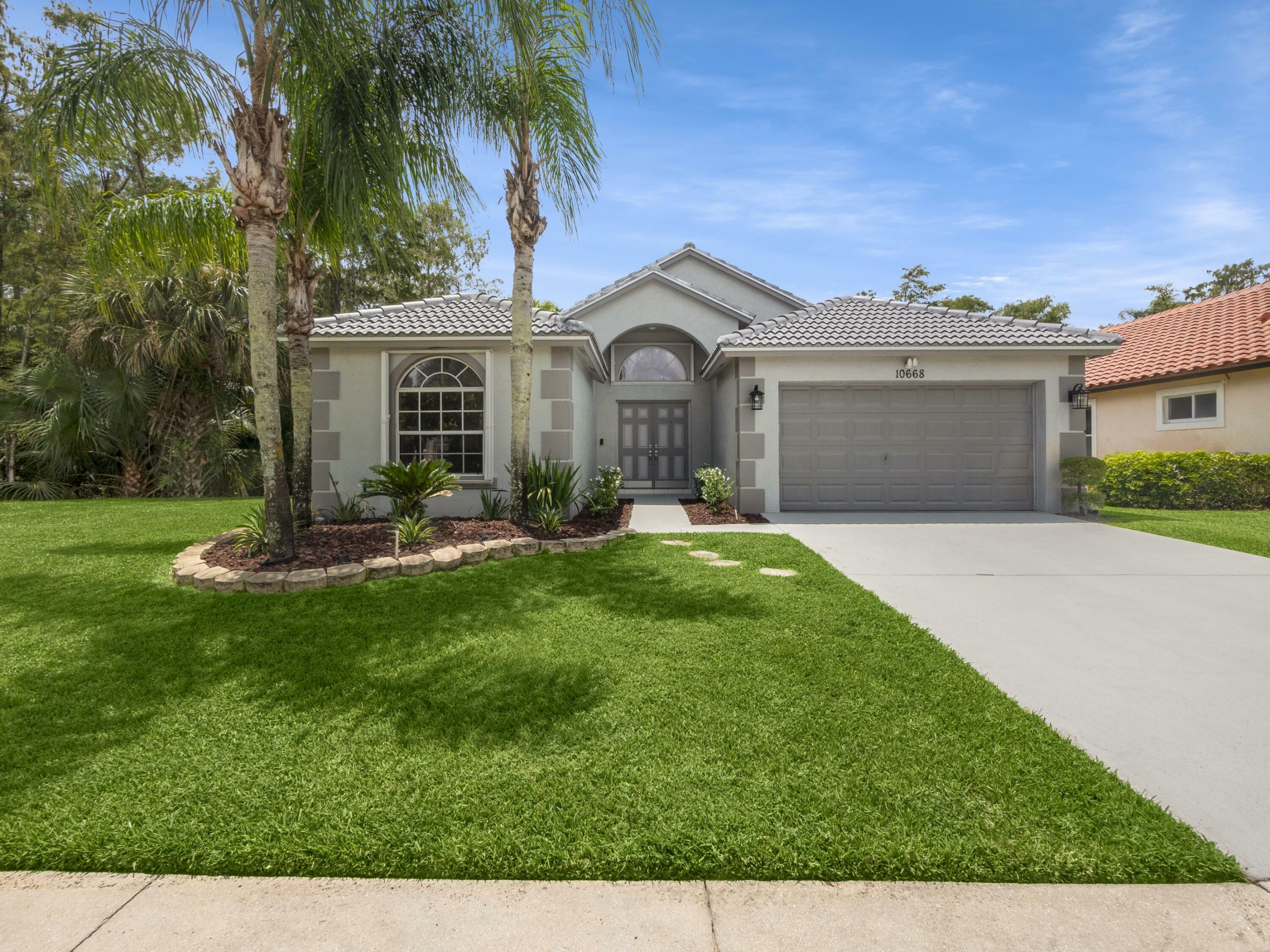 Property Photo:  10668 Oak Bend Way NW  FL 33414 