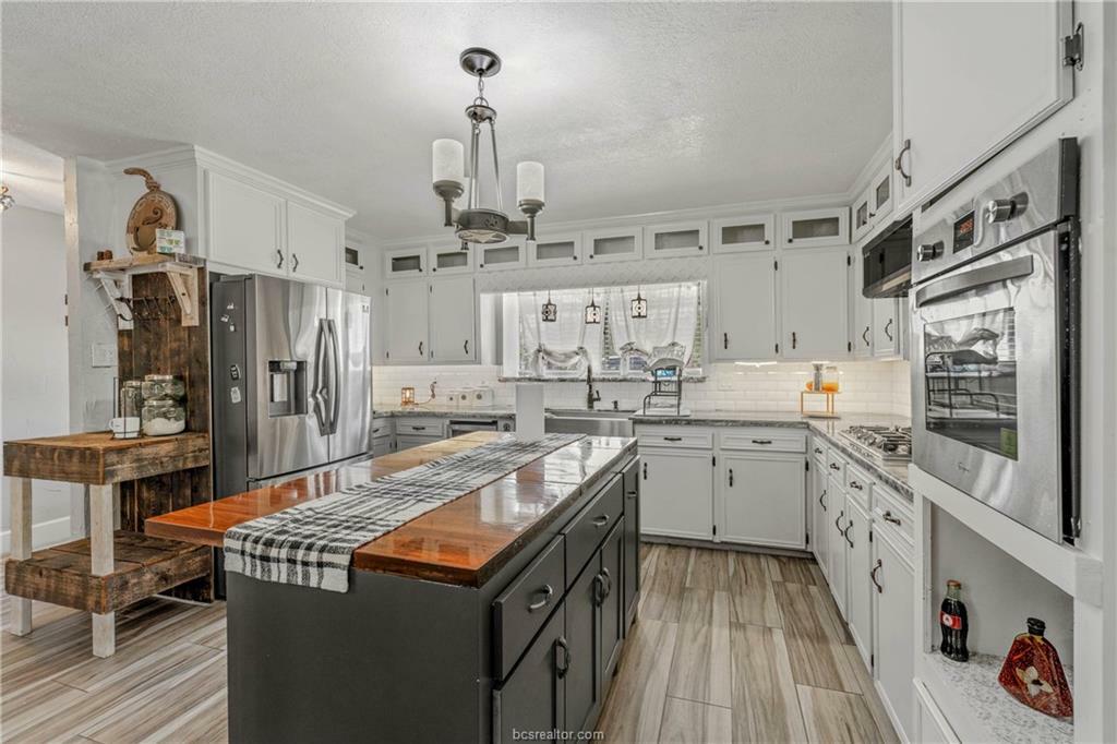 Property Photo: 2501 Rustling Oaks Drive TX 77802-2025