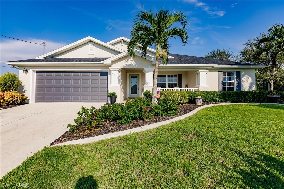 Property Photo:  613 NW 18th Avenue  FL 33993 