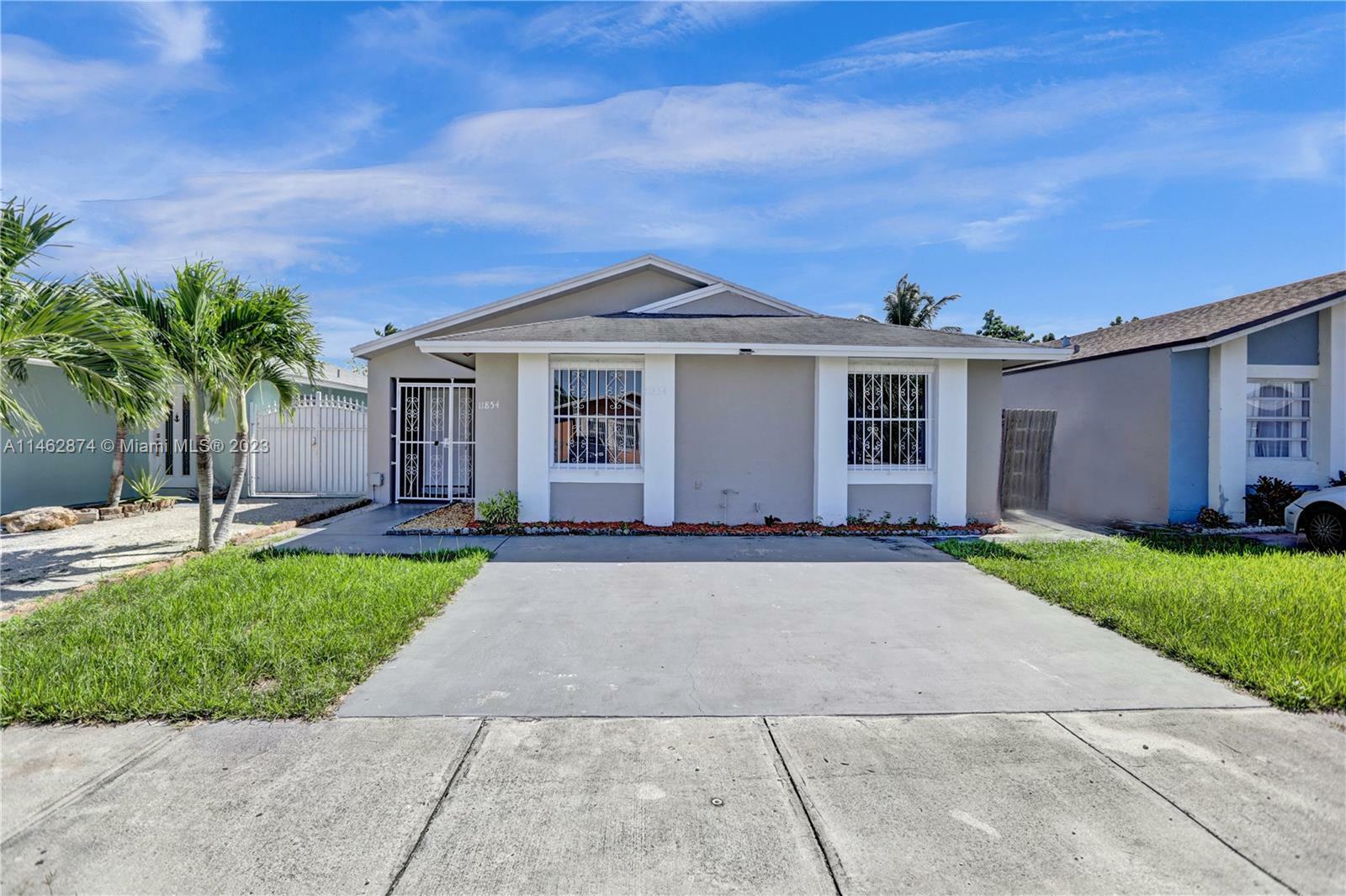 Property Photo:  11854 SW 210th St X  FL 33177 