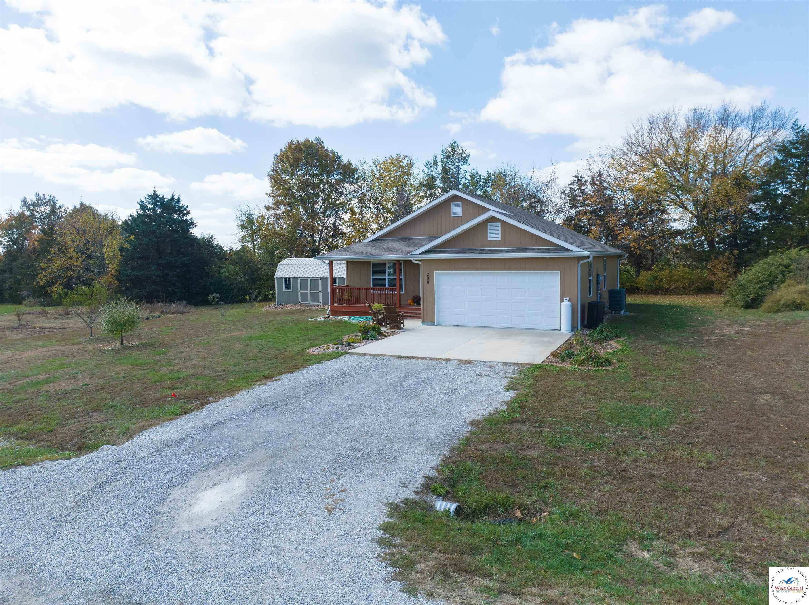 Property Photo:  208 N Cherry  MO 65325 