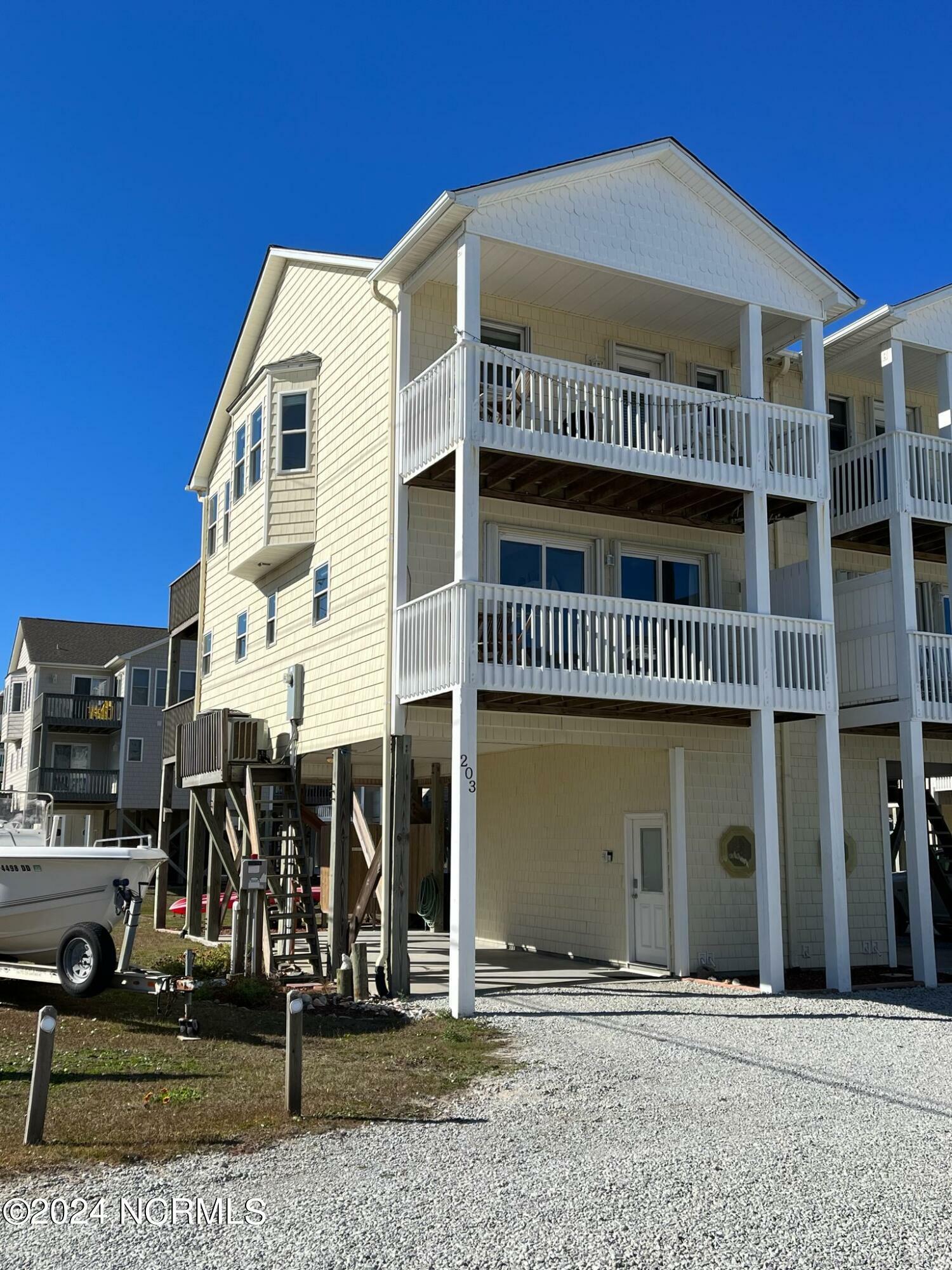 Property Photo:  203 Pinellas Bay Drive  NC 28460 