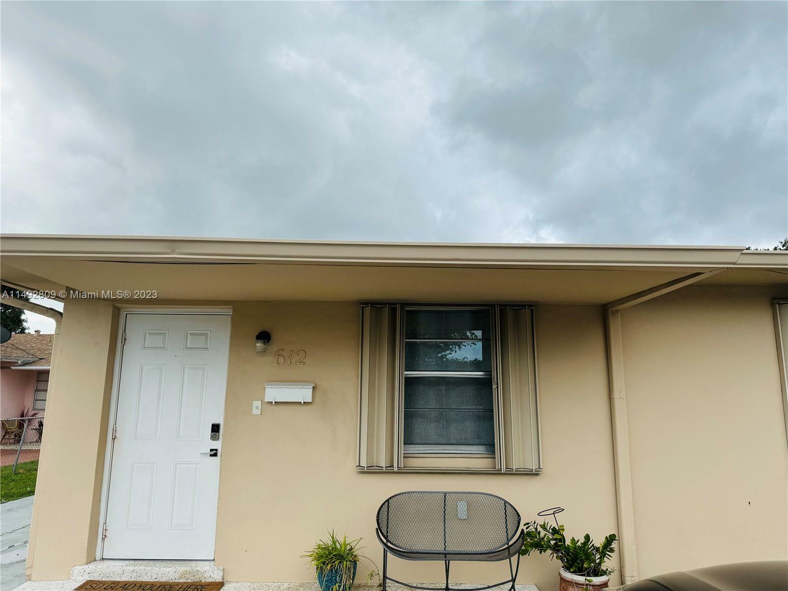 Property Photo:  612 NW 43rd 612  FL 33126 