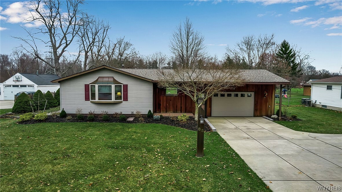 Property Photo: 85 Haussauer Road NY 14068