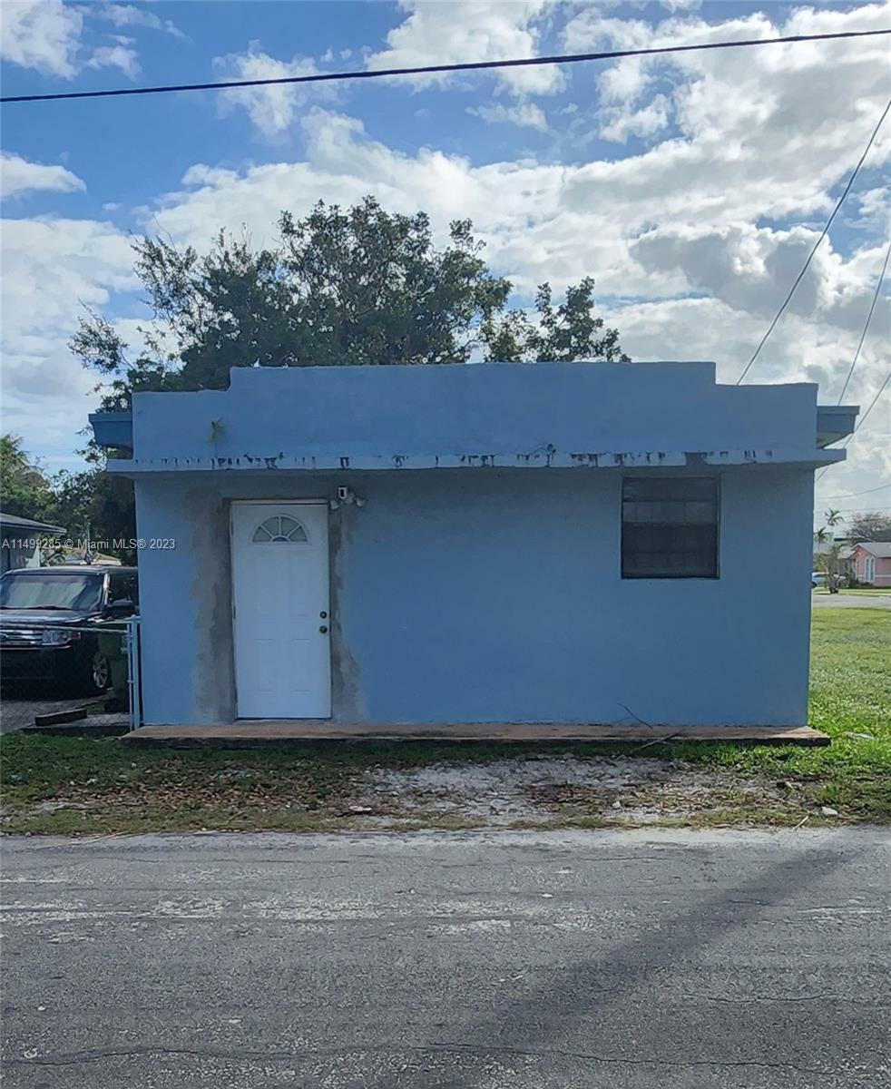 Property Photo:  313 NW 7th Ct  FL 33009 