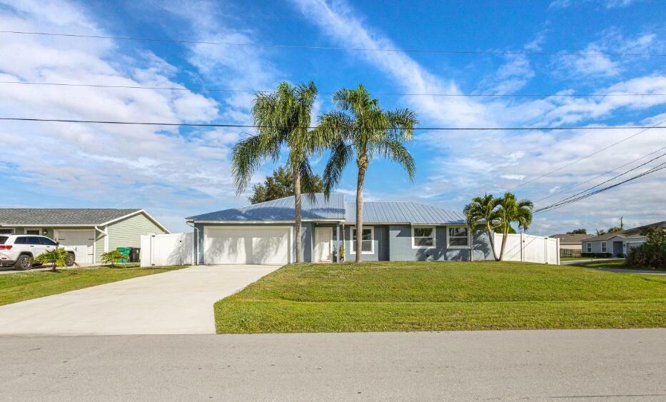 Property Photo:  967 SW Aviation Avenue  FL 34953 