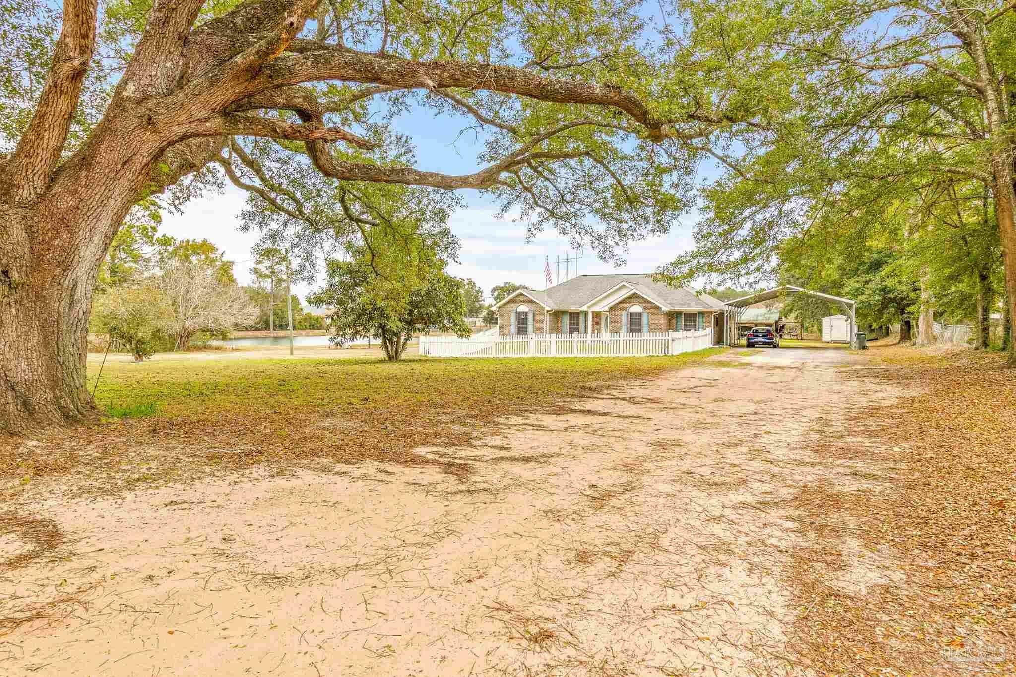 Property Photo:  8410 Beulah Rd  FL 32526 