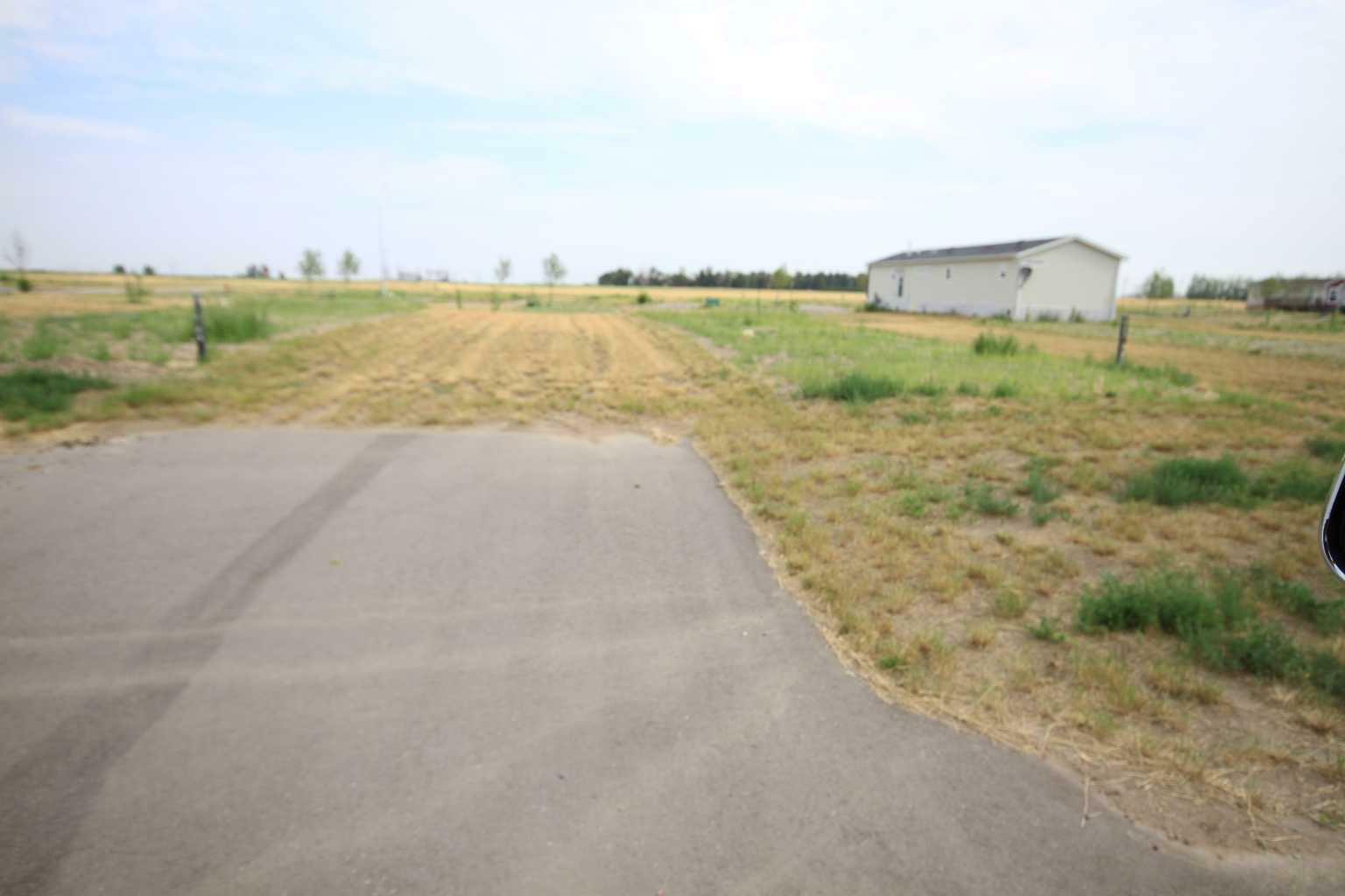 Property Photo:  4761 72 Avenue  AB T1G 0G7 