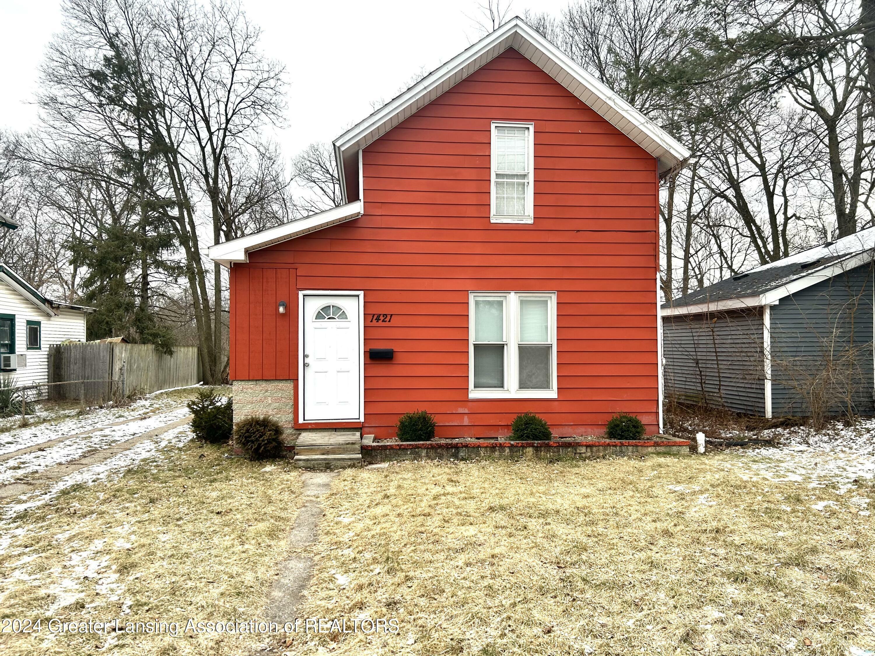 Property Photo:  1421 Lyons Avenue  MI 48910 