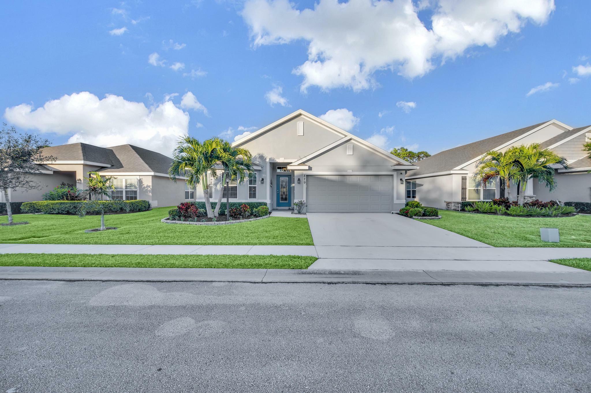 Property Photo:  879 NE Whistling Duck Way  FL 34983 