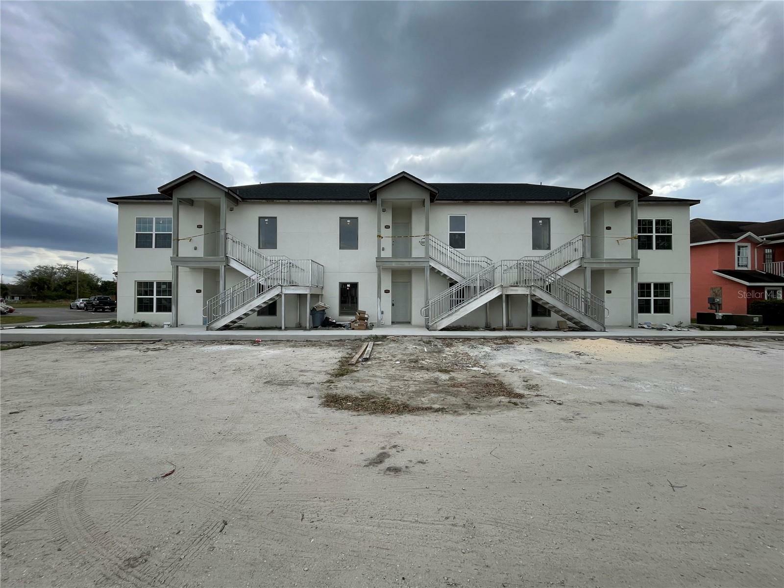 Property Photo:  262 Royal Palm Drive 101,102,103,201,202,203  FL 34743 