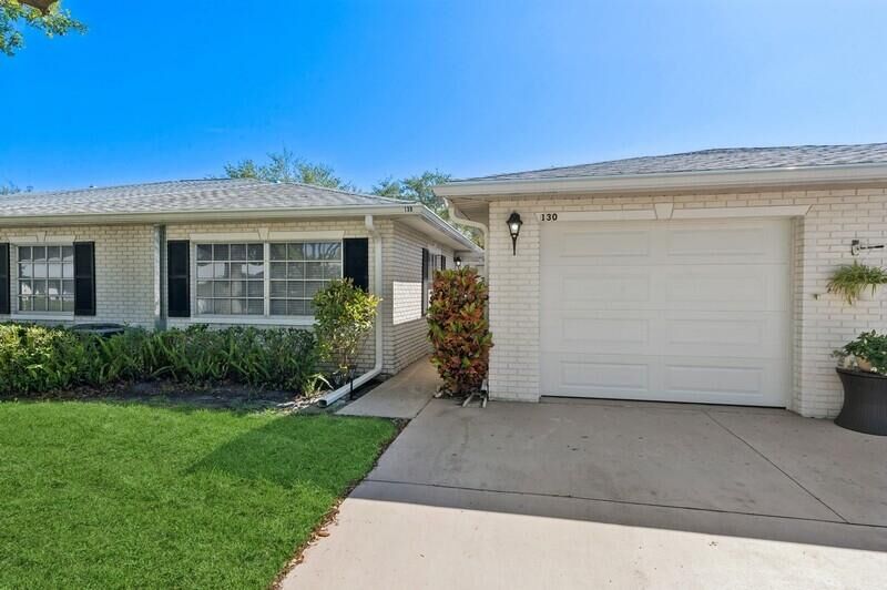 Property Photo:  10128 S 42nd Drive 130  FL 33436 