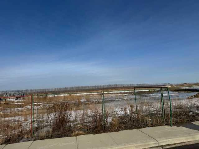 Property Photo: 129 McGhee Street AB T9J 0H2