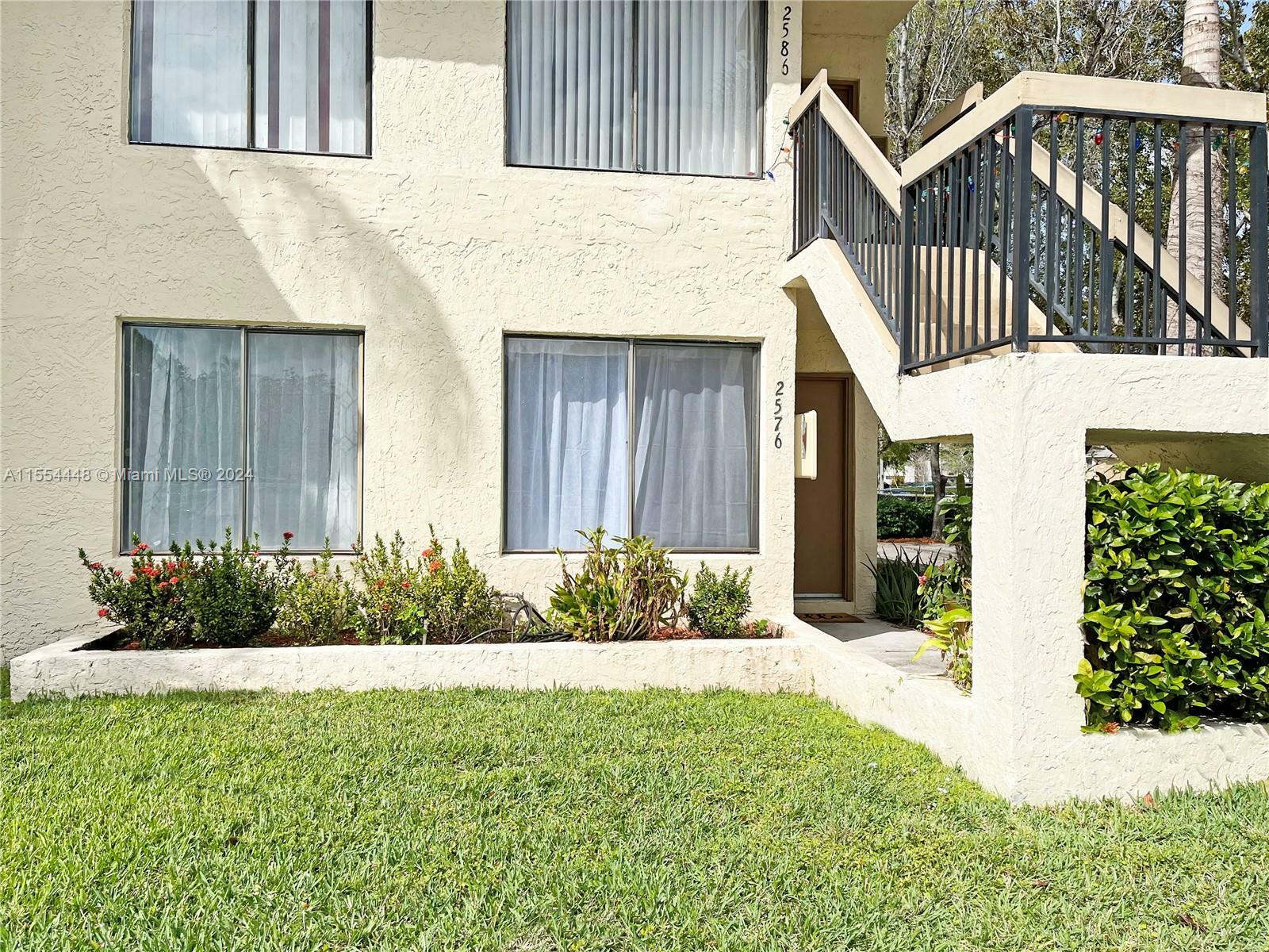 Property Photo:  2576 Riverside Dr 415  FL 33065 