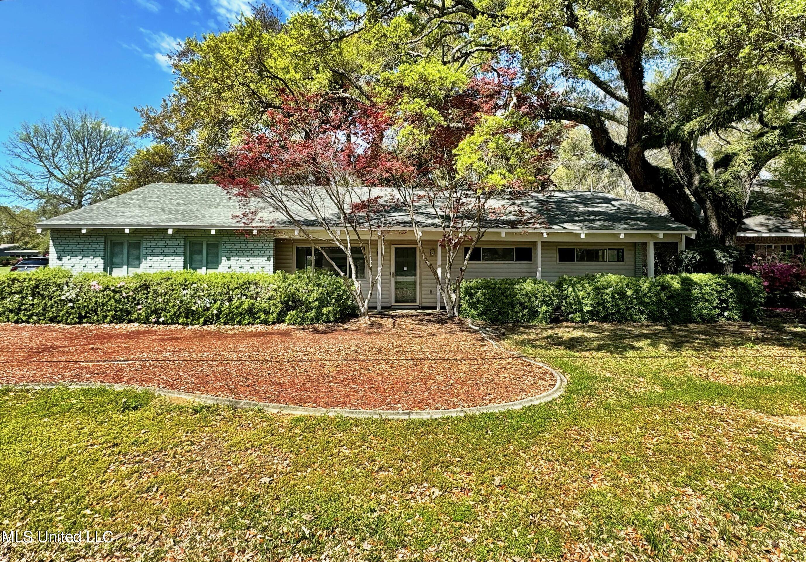 Property Photo:  6621 Golf Club Drive  MS 39525 