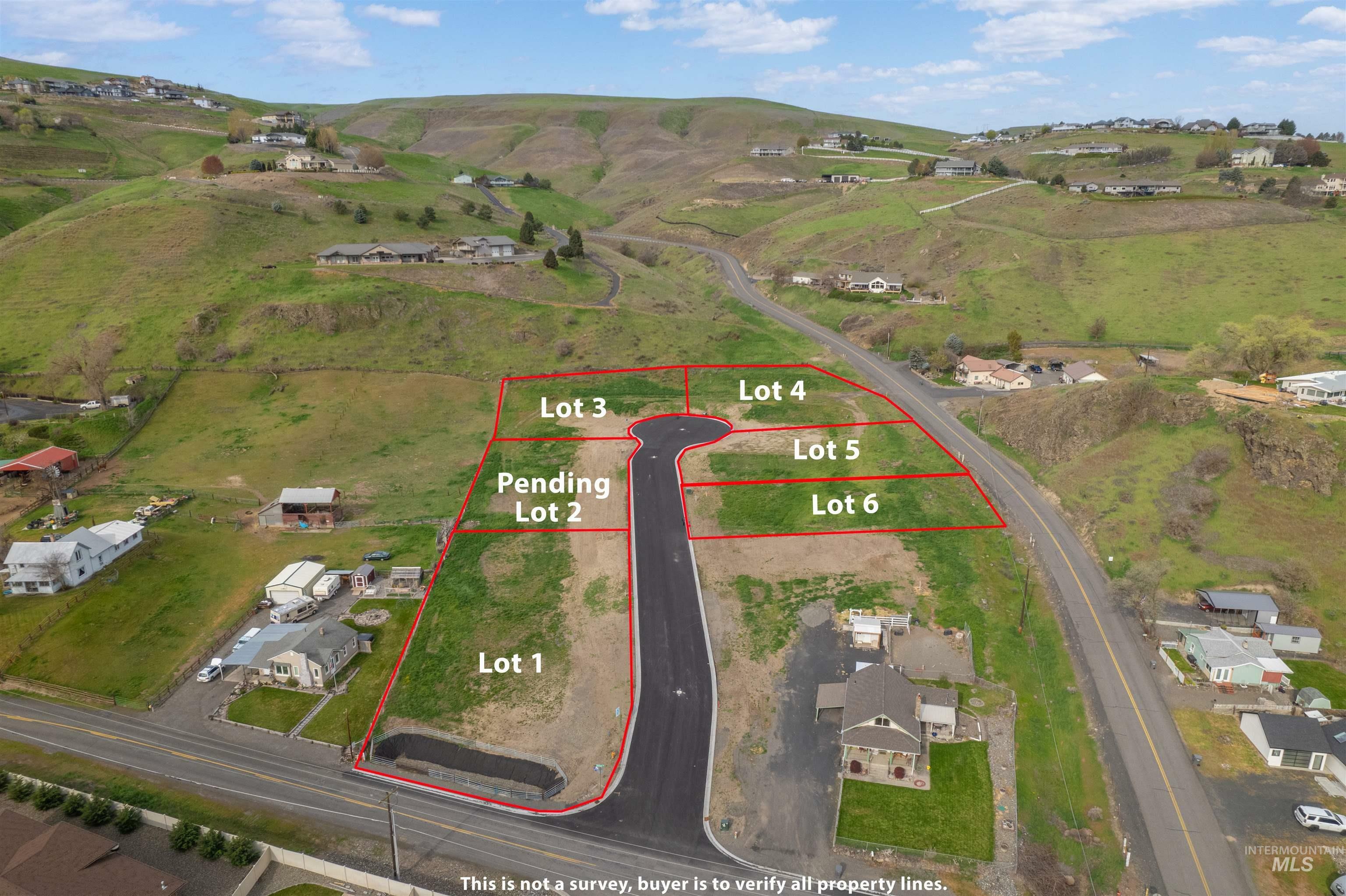 Property Photo:  1502 Arkenstone Court Lot 6  WA 99403 