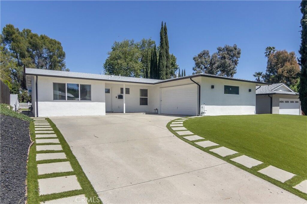 Property Photo:  24225 Calvert Street  CA 91367 