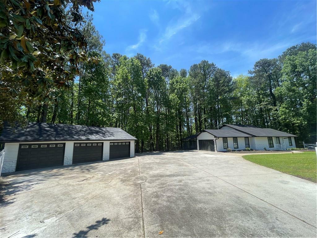 Property Photo:  6147 Shadow Rock Drive  GA 30058 