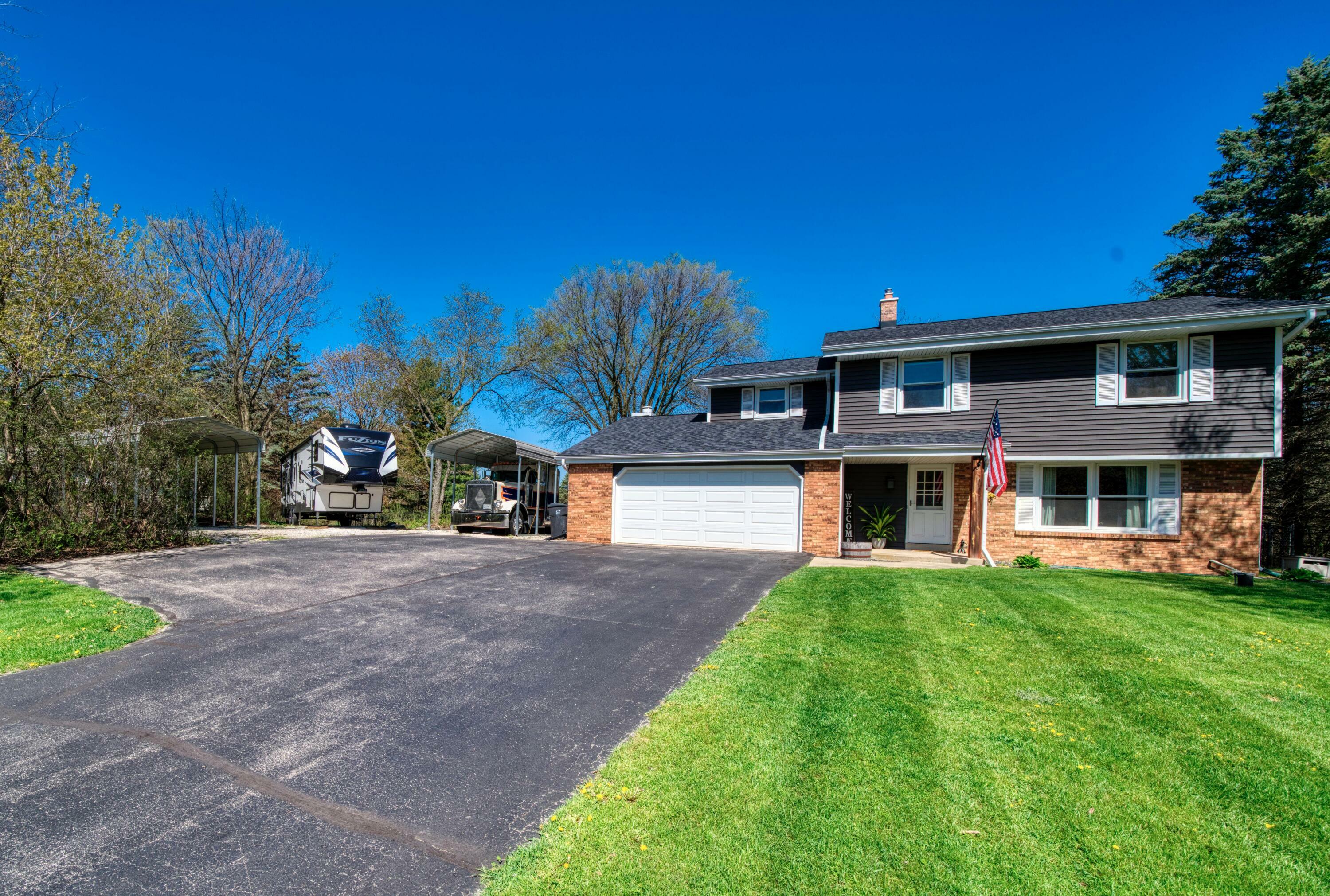 Property Photo:  W246s6825 Maple Hill Dr  WI 53189 