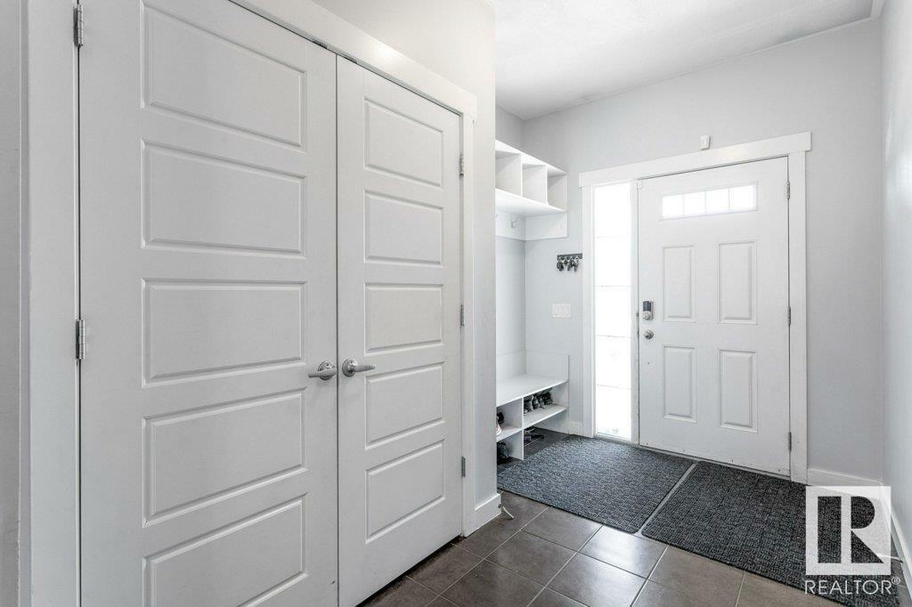 Property Photo:  9911 217 Street NW  AB T5T 4T7 