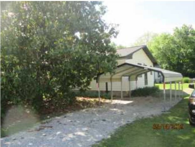 Property Photo:  1002 SE 3rd Street  AR 72712 