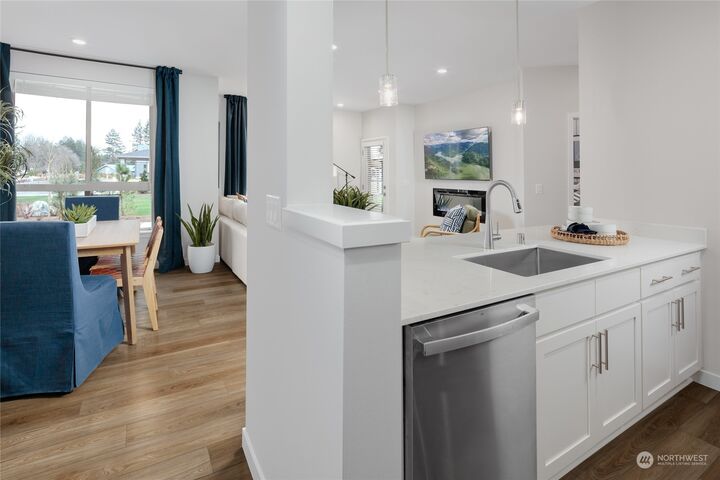 Property Photo:  1229 Meander Way SE 102  WA 98045 