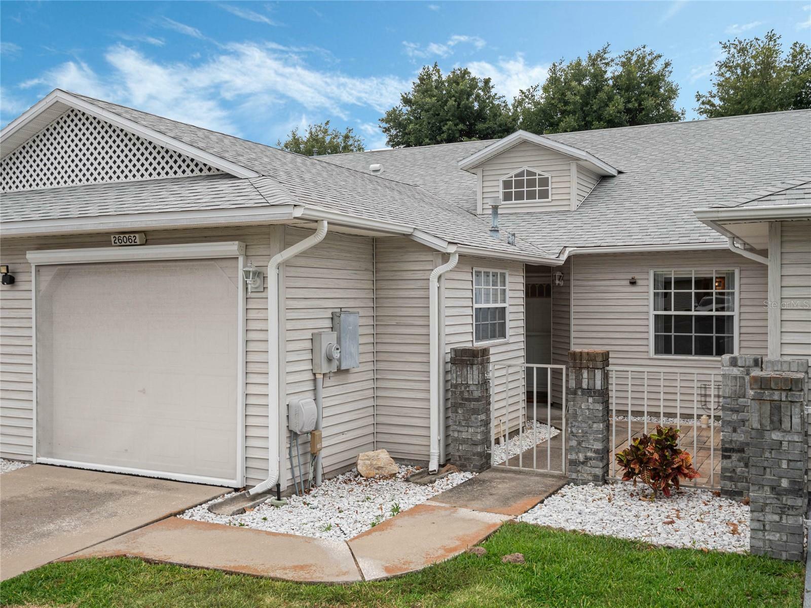 Property Photo:  26062 Newcombe Circle  FL 34748 