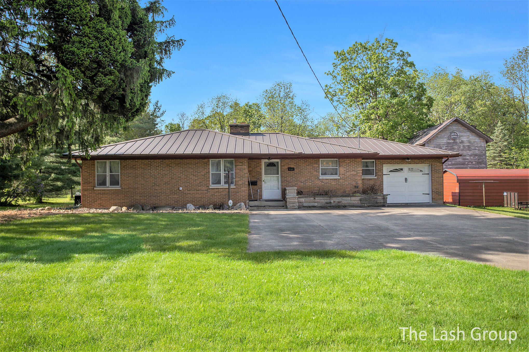 Property Photo:  411 W Capital Avenue  MI 49021 