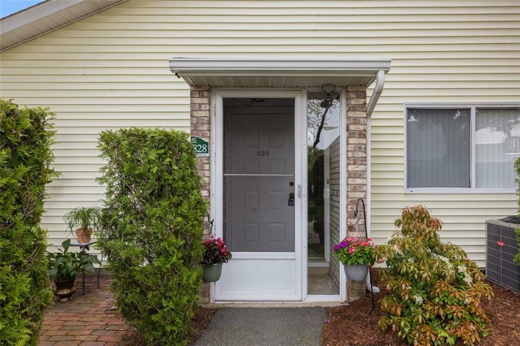 Property Photo: 828 Williamsburg Circle RI 02886