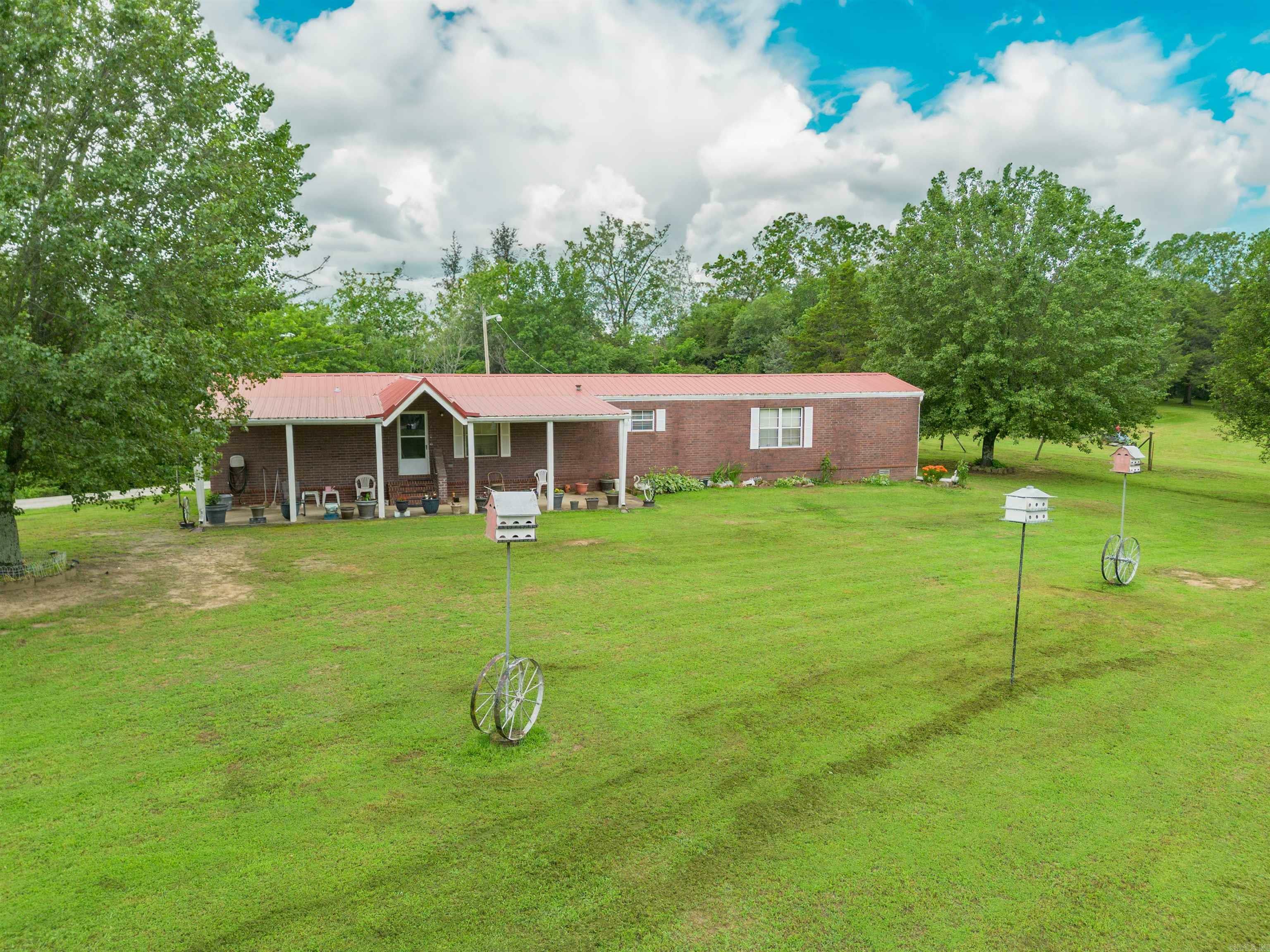 Property Photo:  110 S Alexander Street  AR 72107 