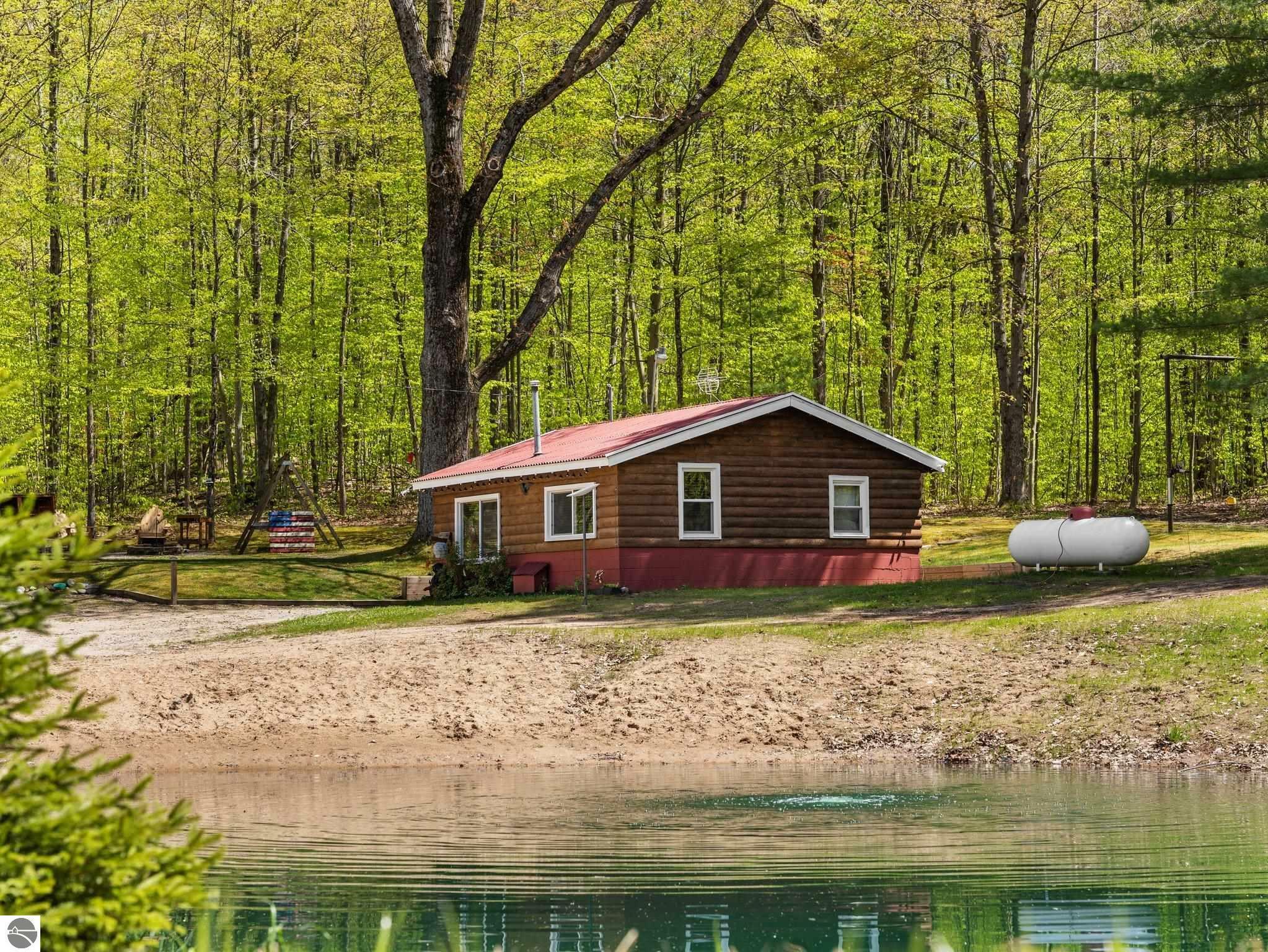 Property Photo:  8115 E 9 Mile Road  MI 49656 