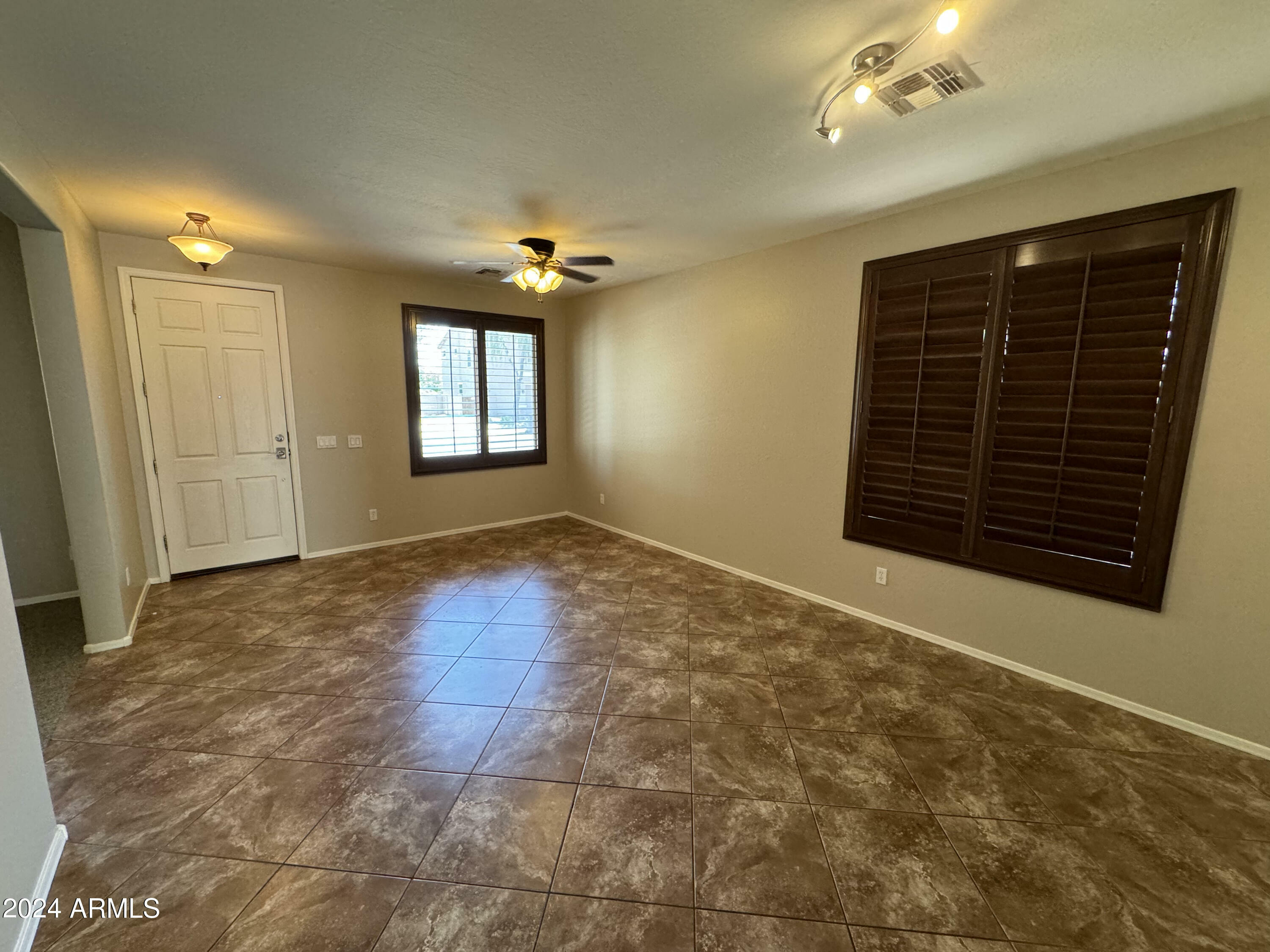 Property Photo:  15764 W Sierra Street  AZ 85379 