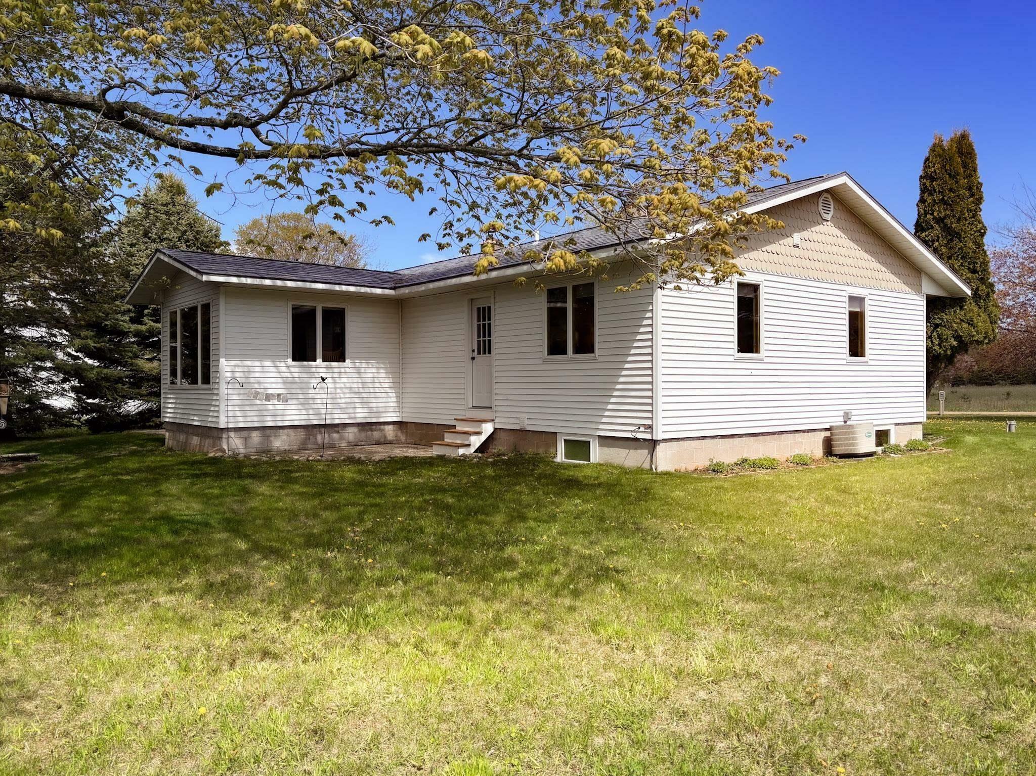 Property Photo:  8937 Middle Village  MI 49740 