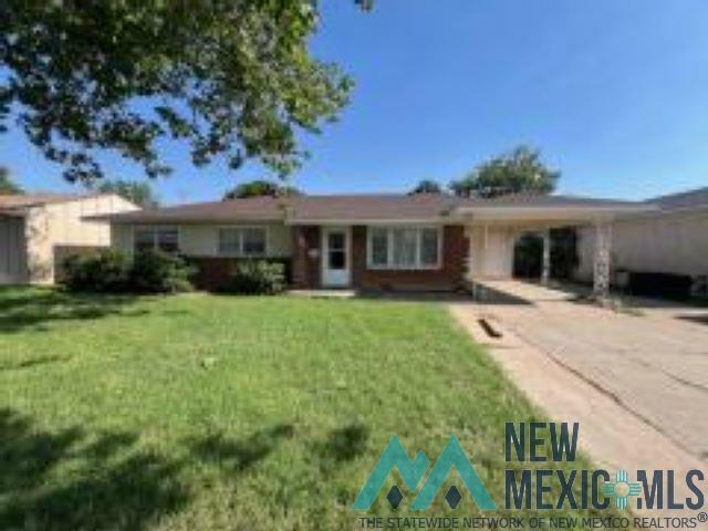 Property Photo: 604 W Christopher Drive NM 88101