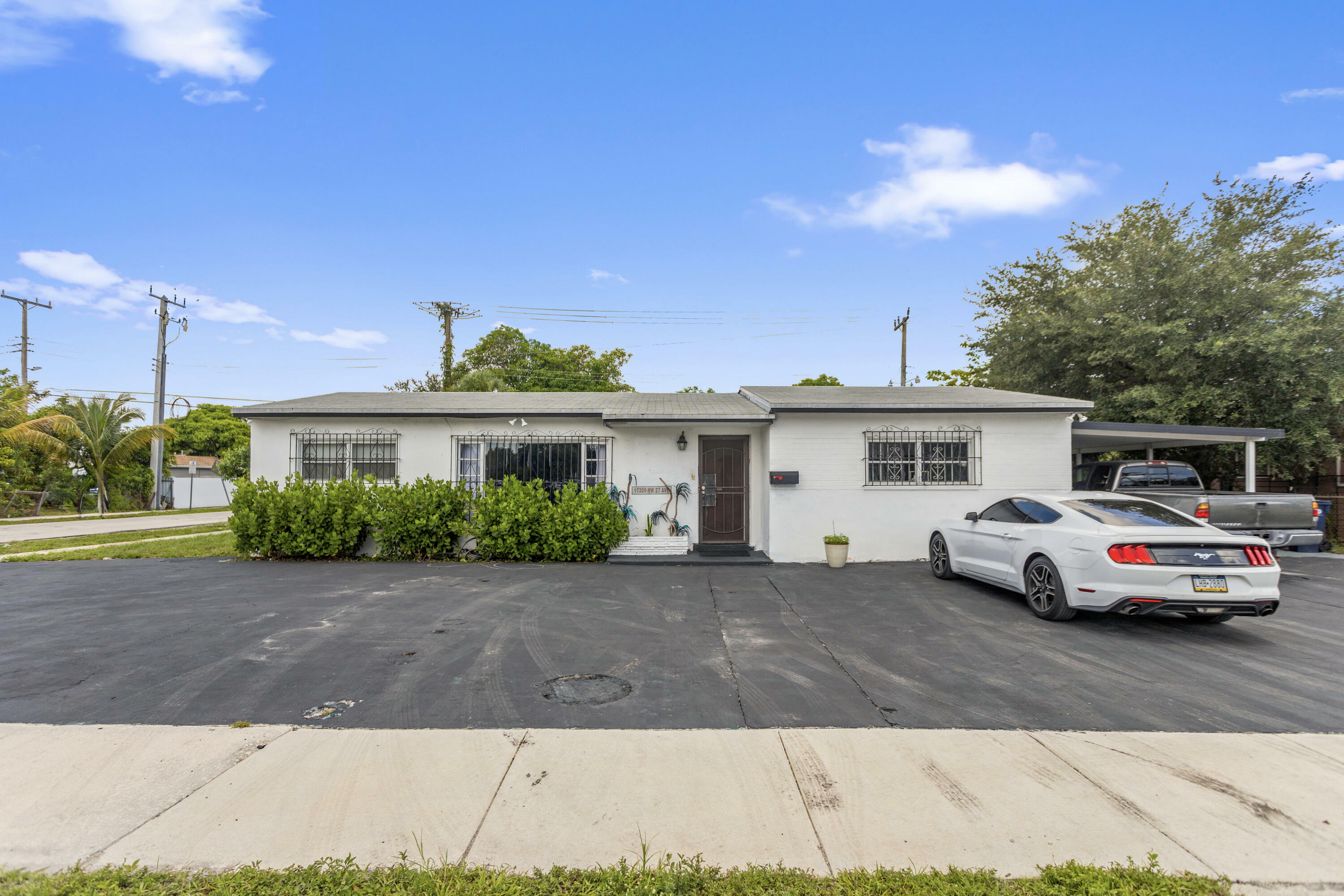 Property Photo:  17320 NW 27th Avenue  FL 33056 