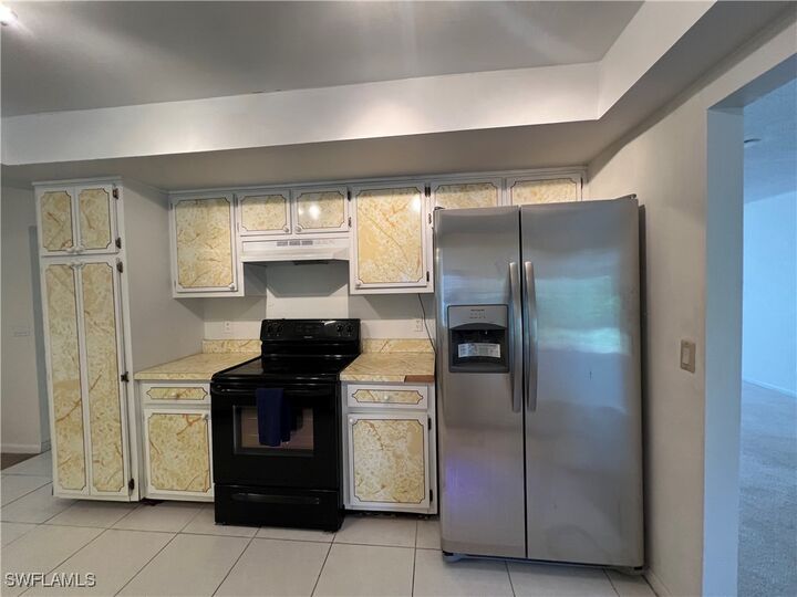 Property Photo:  219 SE 46th Terrace  FL 33904 