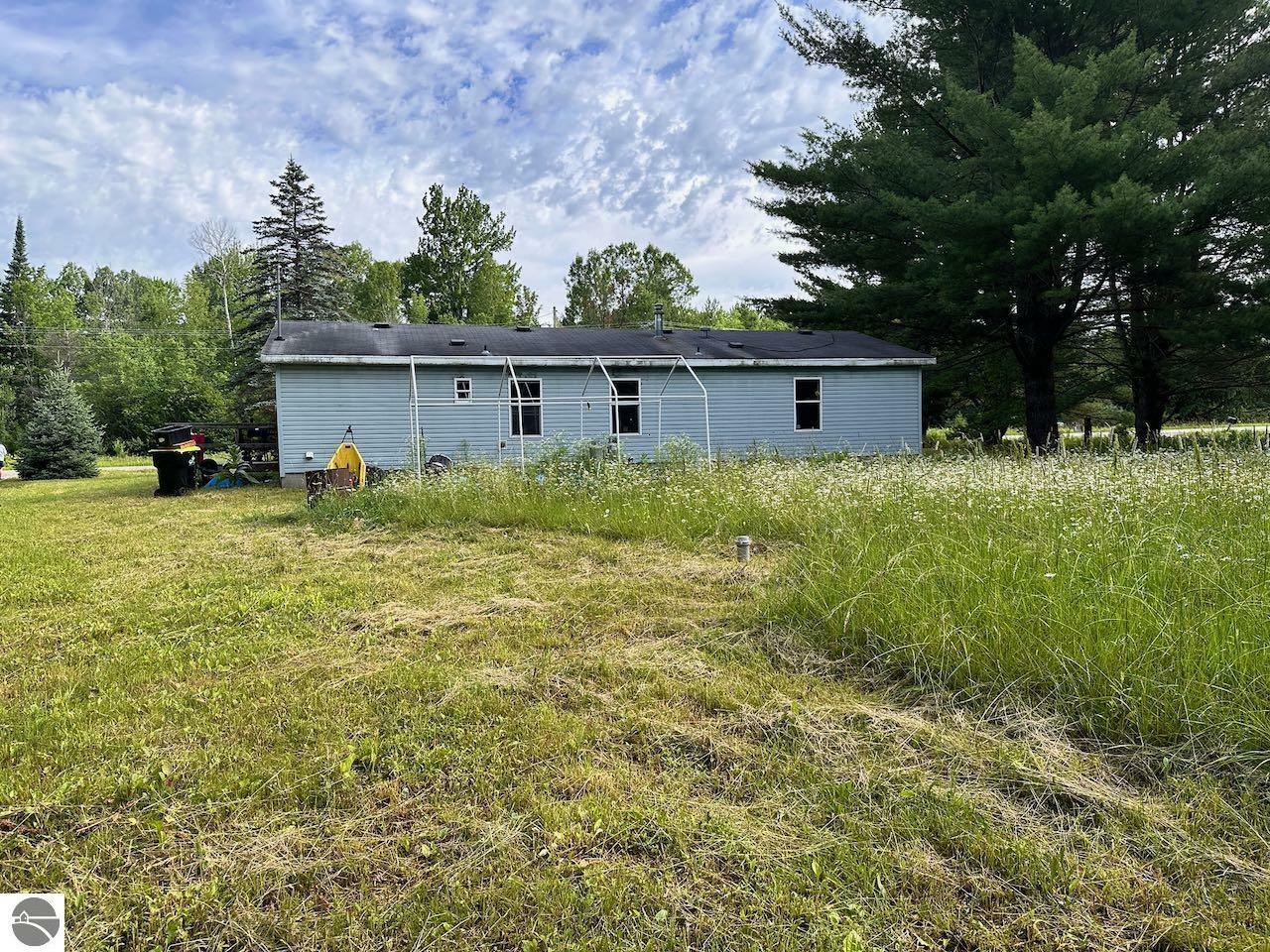 Property Photo:  6699 Alden Highway  MI 49615 