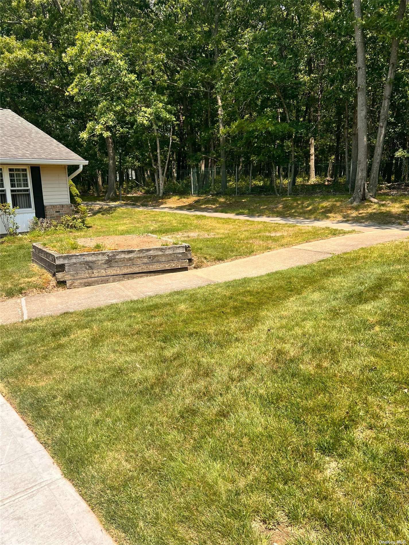 Property Photo:  380 Woodbridge Drive D  NY 11961 