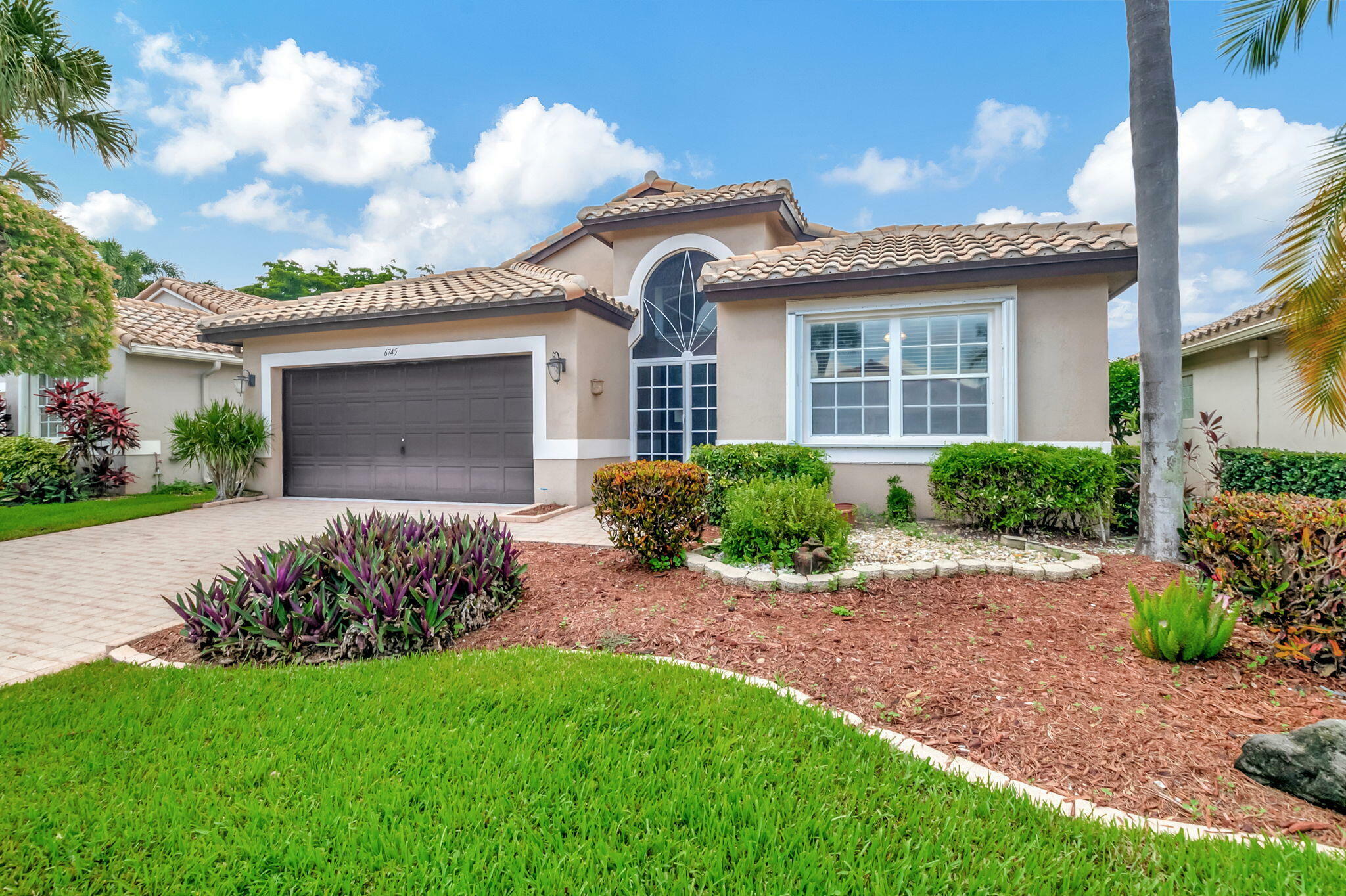 Property Photo:  6745 Sherbrook Drive  FL 33437 