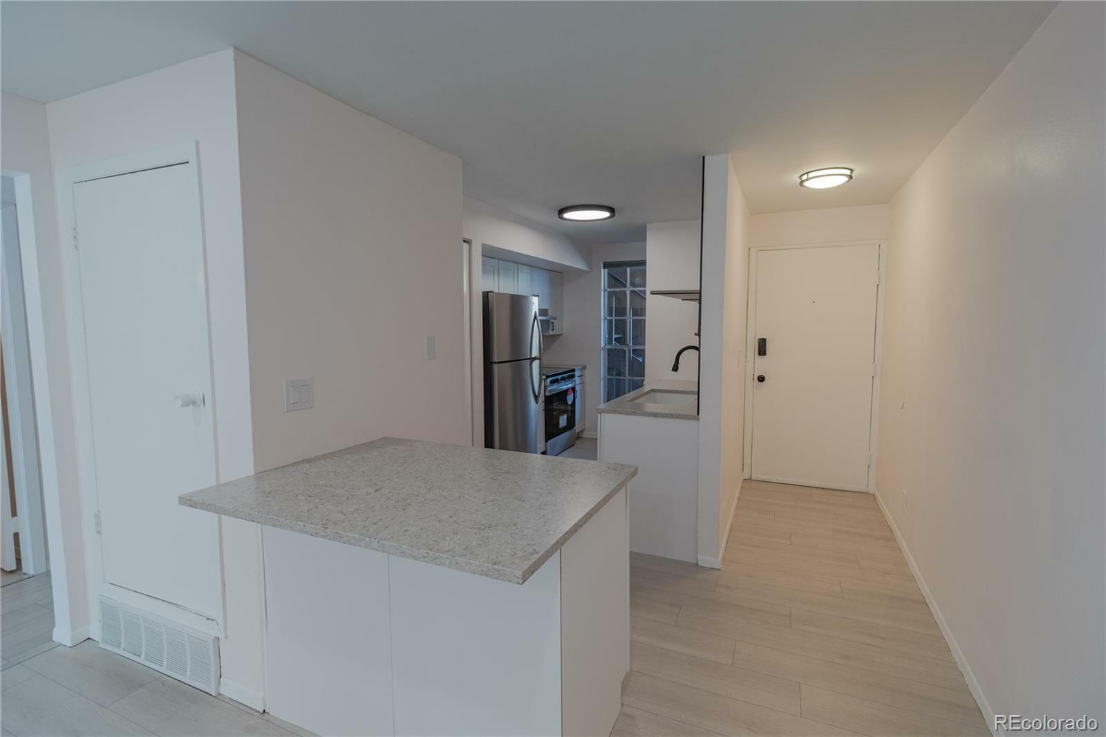 Property Photo: 865 S Quebec Street 202B CO 80247