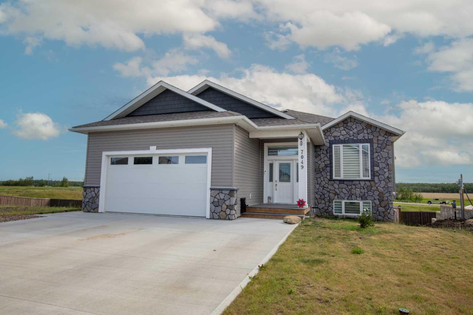 Property Photo: 7049 85 Street AB T8X 0J3