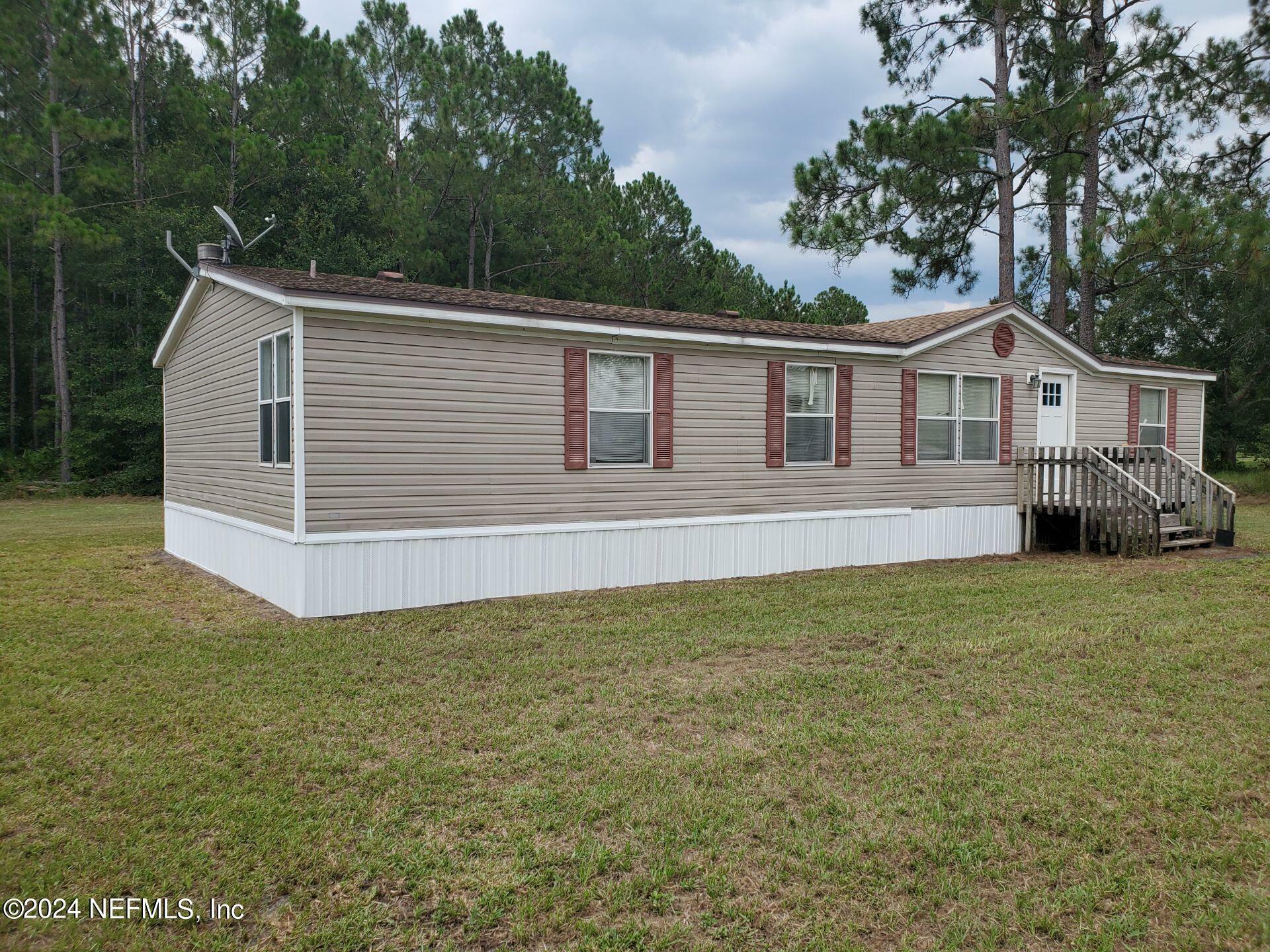 Property Photo:  5633 Wandering Trail  FL 32219 